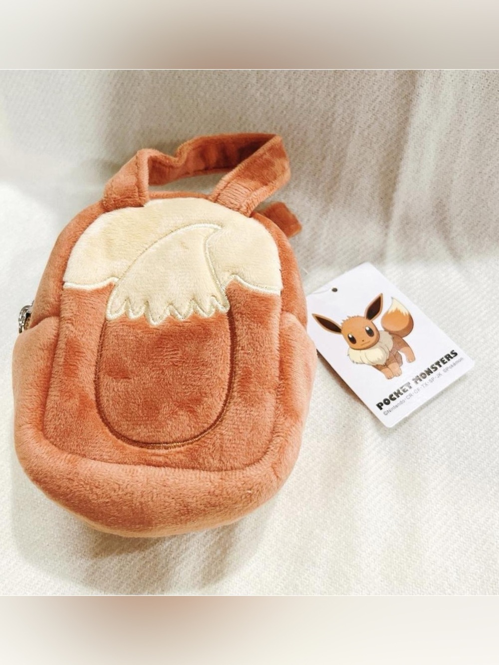 Brand New pokemon eevee fluffy mini pouch bag with handle